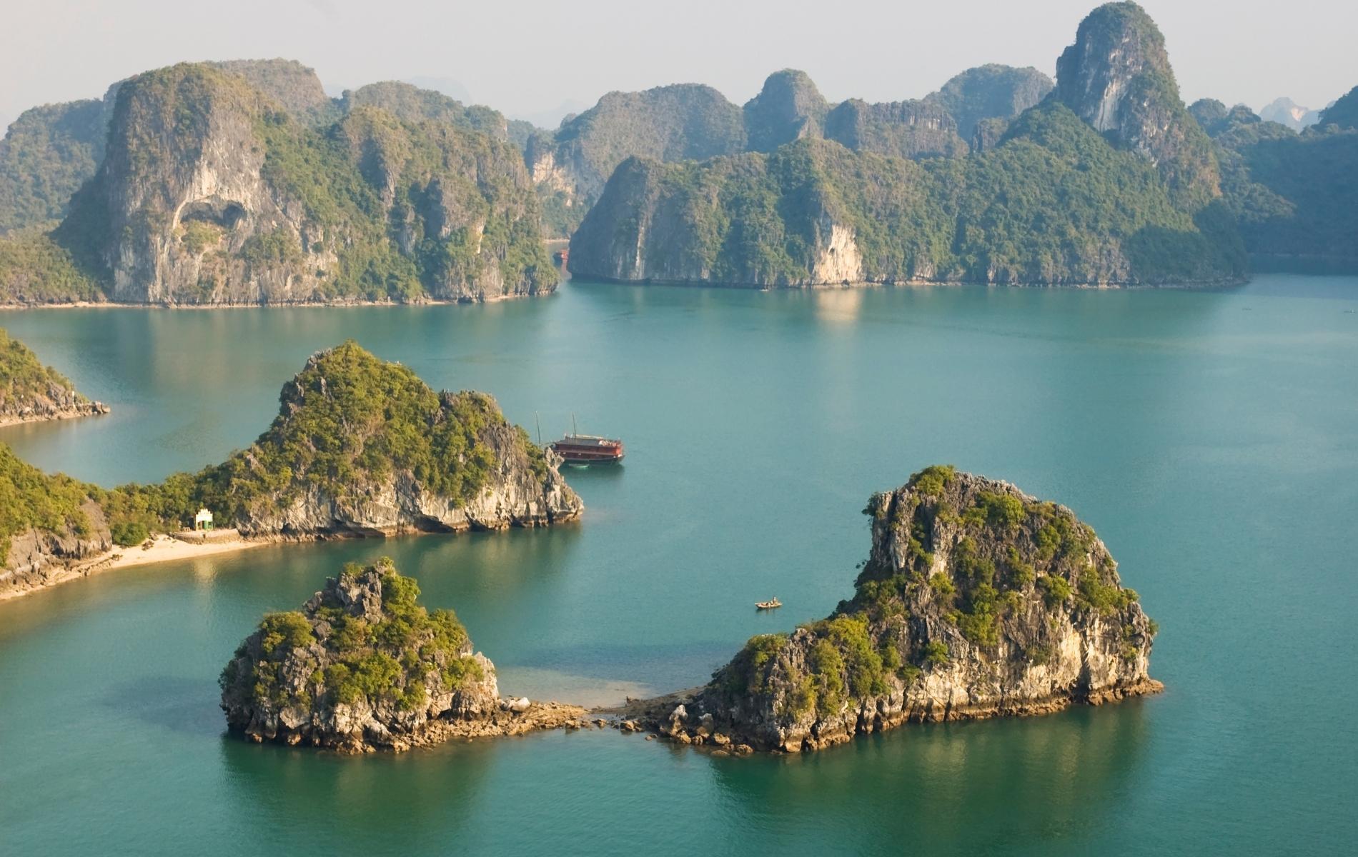 Dragon Shaped Mountains And Jade Green Waters In Halong Bay